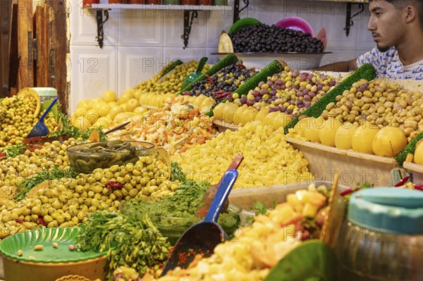 Colourful range of market stands with a variety of fruits and vegetables