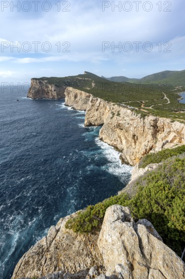 View of steep cliffs by the sea, coastal landscape, cliffs on the Capo Caccia headland, Alghero, Sardinia, Italy