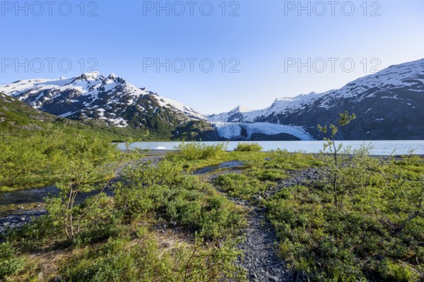 On the shores of Portage Lake, Snowy Mountains and Glaciers Portage Glacier, Chugach National Forest, Alaska, USA