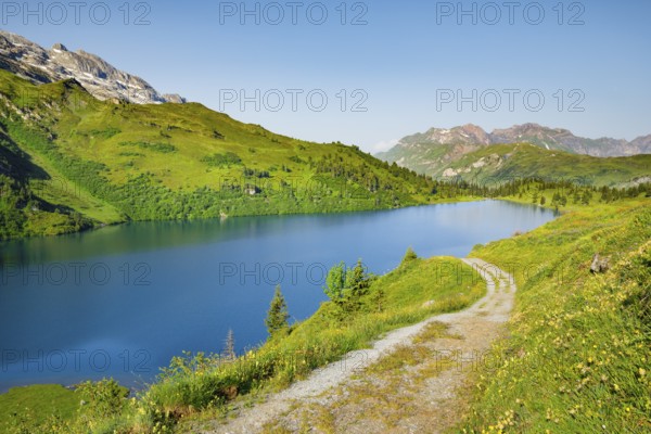 Hiking trail along Lake Engstlensee, Engstlenalp, Canton of Bern, Switzerland