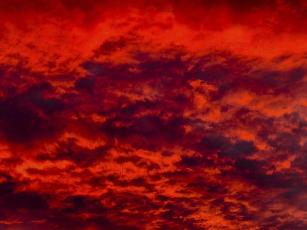 Dramatic dawn with red and black clouds in Hamburg on 02.12.2025, Hamburg, Germany