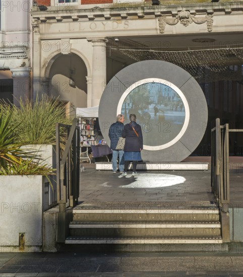 People on the Cornhill in the town centre view the first ever UK Portal in Ipswich, Suffolk, England, UK