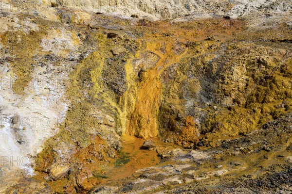 Orange, steep geological formation with volcanic character and rocky texture, geothermal area, rainbow rocks Tuzla, Ayvacik, Ayvacik, Çanakkale, Canakkale, Turkey