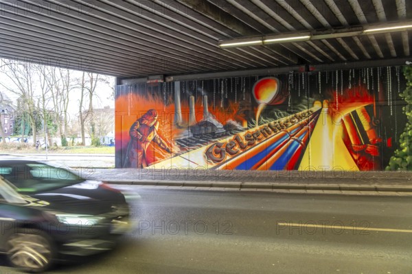 Huge street art pictures in a road tunnel in Gelsenkirchen, the approximately 120 meter long railway underpass of Wickingstraße was extensively painted and sprayed on both sides by 11 Gelsenkirchen graffiti artists and collectives, over a total length of 174 meters, the wall paintings showed motifs from Gelsenkirchen history, from economy, coal, steel, soccer, culture, life, on the 150th anniversary of the city on 29.11.11.25, North Rhine-Westphalia, Germany