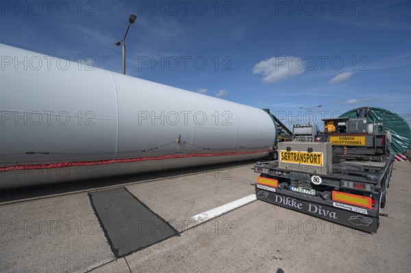 Overlong heavy-duty transporter with a part of a wind turbine, at a motorway rest area of the A9, Mecklenburg-Western Pomerania, Germany