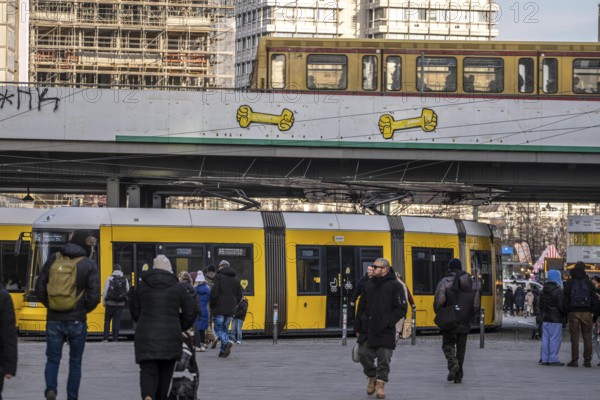 Tram, S-Bahn at Alexanderplatz in Berlin, passers-by, Germany