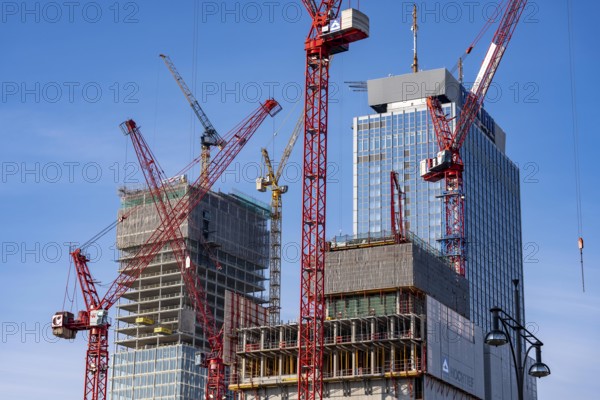 Construction site of the Covivio skyscraper in front, in the vicinity of Alexanderplatz in Berlin, mixed use of apartment, offices, retail and a daycare center, the high-rise construction site of The Berlinian office high-rise building in the back, Germany