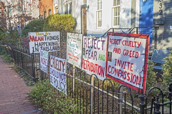 Washington, DC - Signs outside a home on Capitol Hill opposing Trump Administration policies