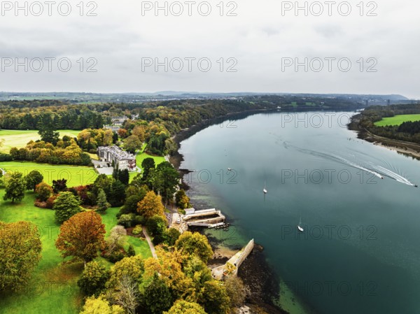Autumn over Plas Newydd House from a drone, Gardens and Parkland, Llanfairpwllgwyngyll, Anglesey, Wales, UK
