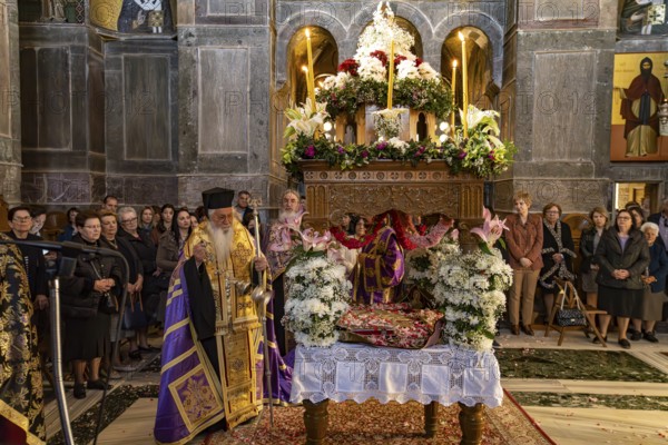 Orthodox priests at Epitaphios at Mass on Good Friday in the Catholicon of the Hosios Luke Monastery, UNESCO World Heritage Site in Steiri, Greece