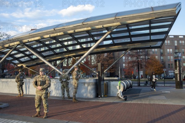 Washington, DC USA - 26 Novemer 2025 - Ohio National Guardsmen protect the Eastern Market Metro station on Capitol Hill shortly after two West Virginia guardsmen were shot near the White House