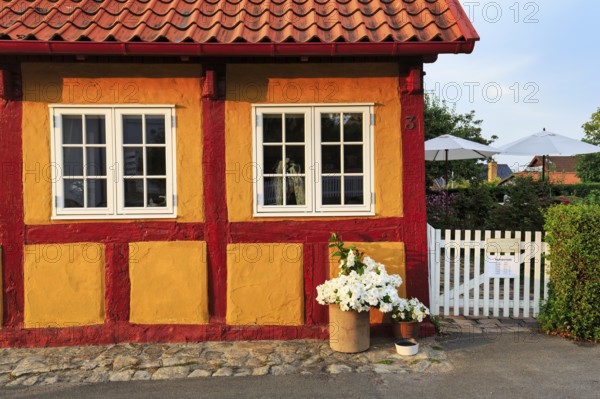 Typical colorful half-timbered house, Gudhjem, Bornholm, Baltic Sea, Denmark
