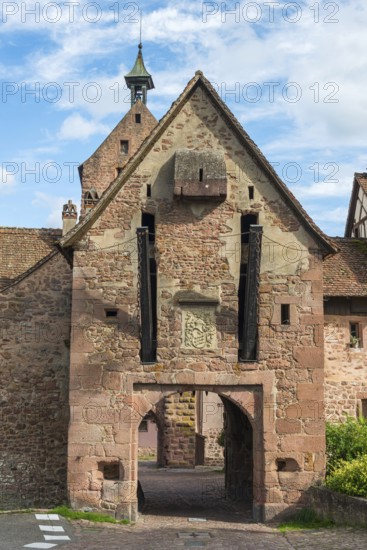 The entrance portal on the city wall of the historic town of Riquewihr, Ellsass