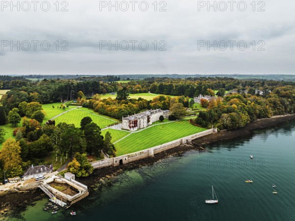 Autumn over Plas Newydd House from a drone, Gardens and Parkland, Llanfairpwllgwyngyll, Anglesey, Wales, UK