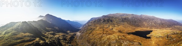 Autumn colours of Pen-y-Pass over Miner's Track, Start Point and road A4086 from a drone, Snowdonia, Wales, UK
