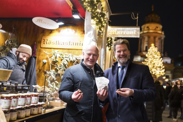Kai Wegner, Governing Mayor of Berlin, with roasted chestnuts at the Christmas market WeihnachtsZauber Gendarmenmarkt on the Gendarmenmarkt, Berlin, 24.11.2025