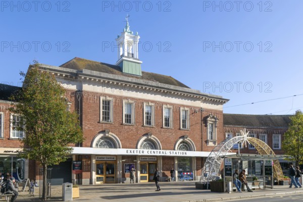 People outside Exeter Central Station railway station, Exeter city centre, Devon, England, UK