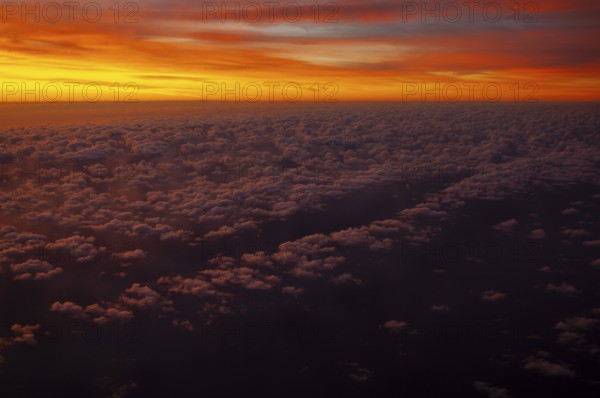 View from airplane window at sunrise