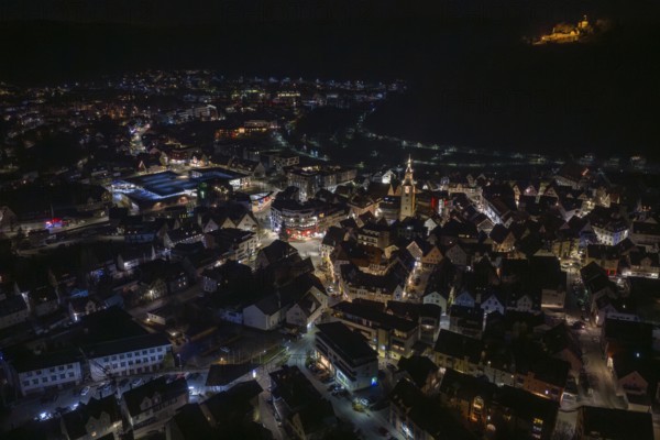 Panoramic view of a city at night with illuminated streets and buildings, Nagold, Calw district, Germany