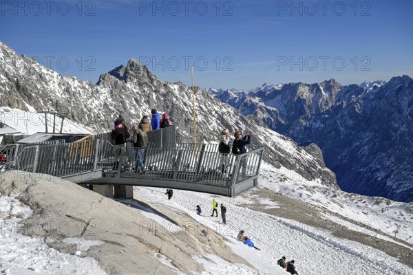 Tourists on a viewing platform on Zugspitzplatt, Grainau municipality, Garmisch-Partenkirchen district, Bavaria, Germany