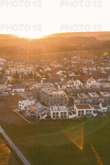 Aerial view of a modern built village in the evening light, Althengstett, Calw district, Germany