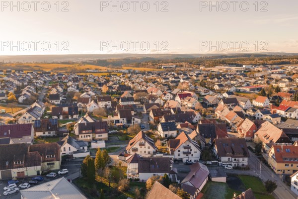 Aerial view of village with vast countryside and clear skies, Althengstett, Calw district, Germany