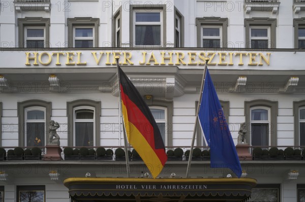 Façade of Hotel Vier Jahreszeiten, German flag, Hamburg, Free and Hanseatic City of Hamburg, Germany