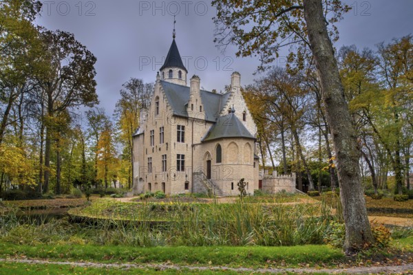 Kasteel Beauvoorde, 17th century moated castle in Renaissance style in the village Wulveringem in autumn, fall, Veurne, West Flanders, Belgium