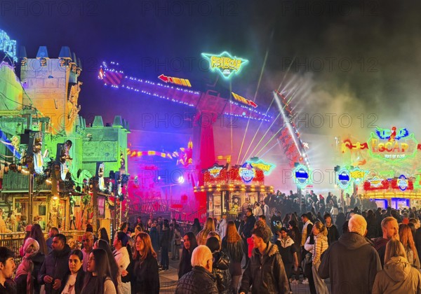 Many people at the All Saints Fair at night, the biggest old town fair in Europe, Soest, North Rhine-Westphalia, Germany