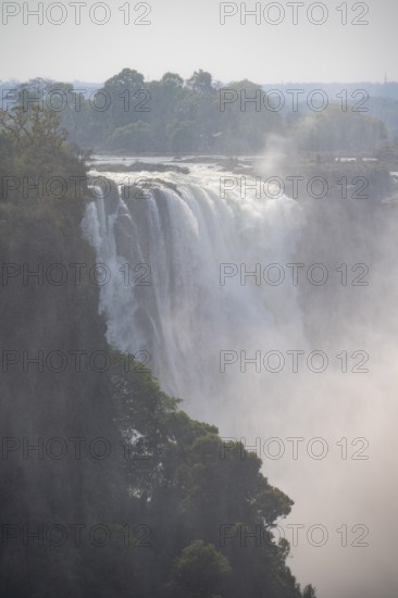 Water plunges into the depths, Victoria Falls with gorge, Zambezi, Zimbabwe