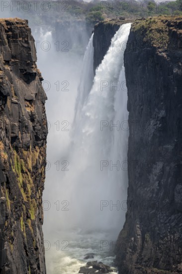 Water plunges into the depths, Victoria Falls with gorge, Zambezi, Zimbabwe