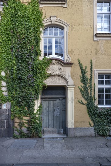 Stucco decoration above the entrance to Johanneum, built in 1905, near St. Johannis 1-3, Hanseatic City of Lübeck, Schlesawig-Holstein, Germany