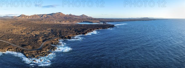 Coast with lava fields, volcanic landscape near Los Hervideros, in the evening light, aerial view, Lanzarote, Canary Islands, Spain
