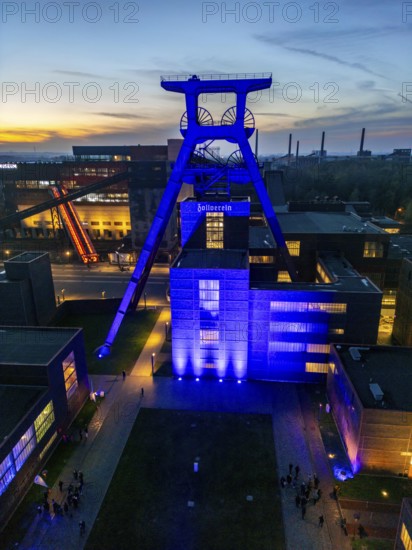 International Children's Rights Day, in addition buildings around the world are illuminated blue, over 60 in Germany, blue illumination for the worldwide action of the United Nations Children's Fund, UNICEF, here the UNESCO World Heritage Zeche Zollverein, the Doppelbock conveyor framework of Schacht XII, Essen, North Rhine-Westphalia
