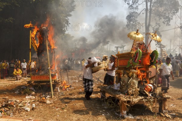 The coffins are incinerated during a corpse cremation (Ngaben) Gianyar, Bali, Indonesia