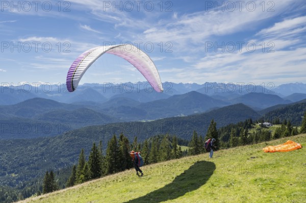 Paragliders starting at Brauneck, Bavarian Prealps, Isarwinkel, Lenggries, Upper Bavaria, Bavaria, Germany