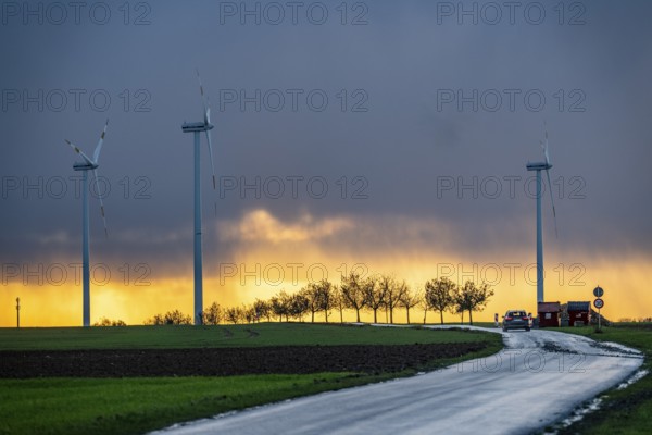 Königshovener Höhe onshore wind farm, on the A44 motorway near Bedburg, in front of the Jackerath triangle, autumn, sunset, recultivated open-cast mining site, Garzweiler open-cast lignite mine, operated by RWE and the city of Bedburg, North Rhine-Westphalia, Germany