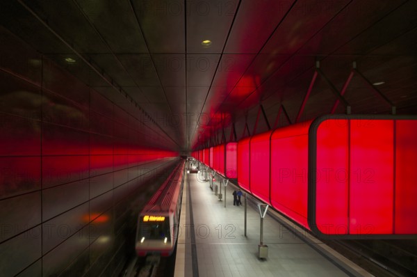 HafenCity University subway station, illuminated in color, red, underground train, movement effect, U4, travelers, platform, stop, train station, subway, public transport, HVV, Hamburger Verkehrsverbund, Hochbahn, public transport, Free and Hanseatic City of Hamburg, Germany