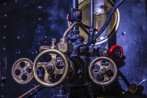 Levers and actuators in the tank car of a historic steam locomotive, Eisenbahnmuseum, Augsburg railway park, administrative district of Swabia, Bavaria, Germany