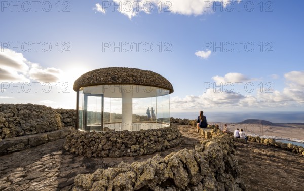 Staircase and viewing platform at the Mirador del Río viewpoint, in the evening light with sun stars, designed by artist César Manrique, Lanzarote, Canary Islands, Spain