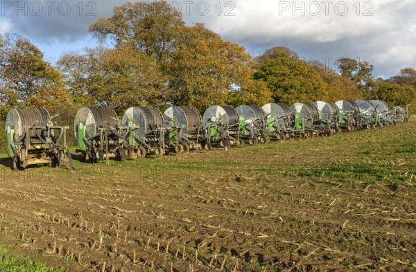 Rainstar E31 irrigation sprayer machinery in field, Shottisham, Suffolk, England, UK