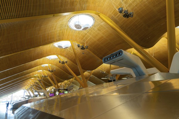 Modern architecture interior of terminal 4 building, Adolfo Suárez Madrid–Barajas airport, Madrid, Spain
