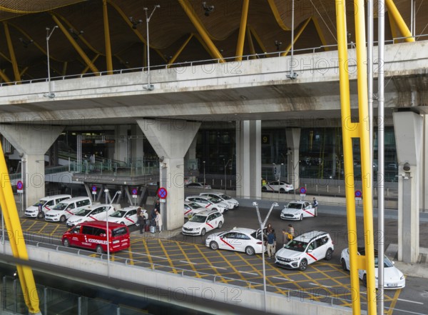 Taxis outside terminal 4 building, Adolfo Suárez Madrid–Barajas airport, Madrid, Spain