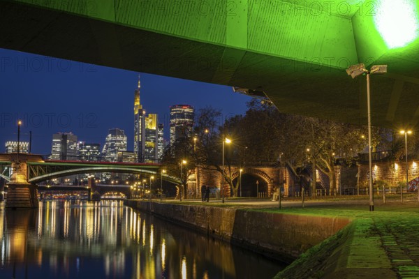 The lights of Frankfurt's banking skyline glow in the evening, Frankfurt am Main, Hesse, Germany