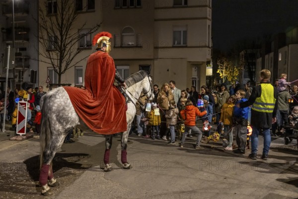 Martinszug in Essen-Rüttenscheid, the parish of St. Lambertus, Saint Martin actor on a horse, with over 500 participants, North Rhine-Westphalia, Germany