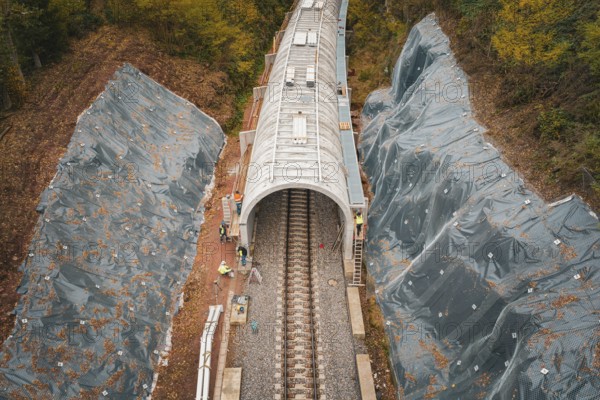 Overview of the tunnel construction site, surrounded by a planned slope, Hermann-Hesse-Bahn construction site, Calw, Germany