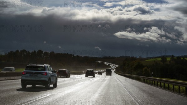 Cars on rain-wet A9 motorway during a thunderstorm, Hof, Upper Franconia, Bavaria, Germany