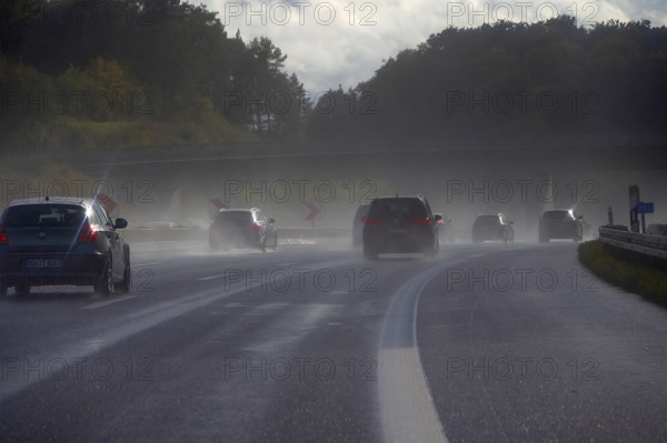 Tourist traffic on the A9 motorway during thunderstorms, Bavarian Forest, Bavaria, Germany