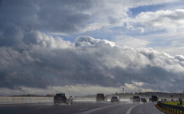 Tourist traffic on the A9 motorway during thunderstorms, Bavarian Forest, Bavaria, Germany