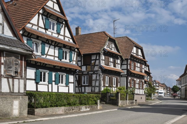 Street with traditional half-timbered houses, Betschdorf pottery village, Alsace, France